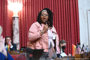 Black delegate receives an anti-abortion message conveyed by a Klan image